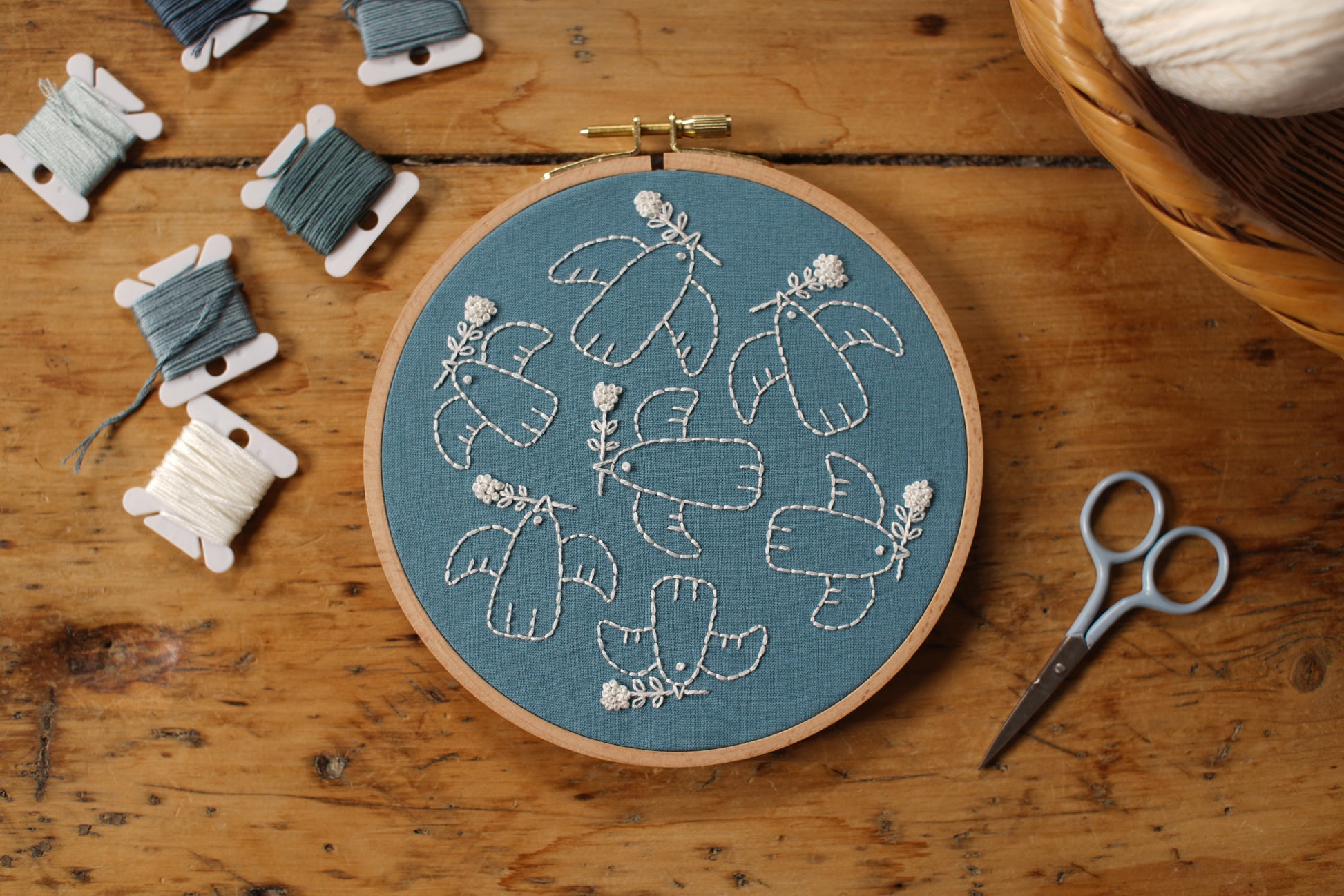 Birds of a Feather embroidery kit by Twin Folk – beginner-friendly peace birds embroidery project with pre-printed fabric and DMC floss.