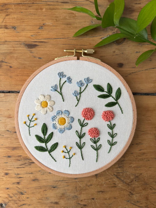 Meadow Bloom embroidery kit by Twin Folk – beginner-friendly floral embroidery project with pre-printed fabric and DMC floss.